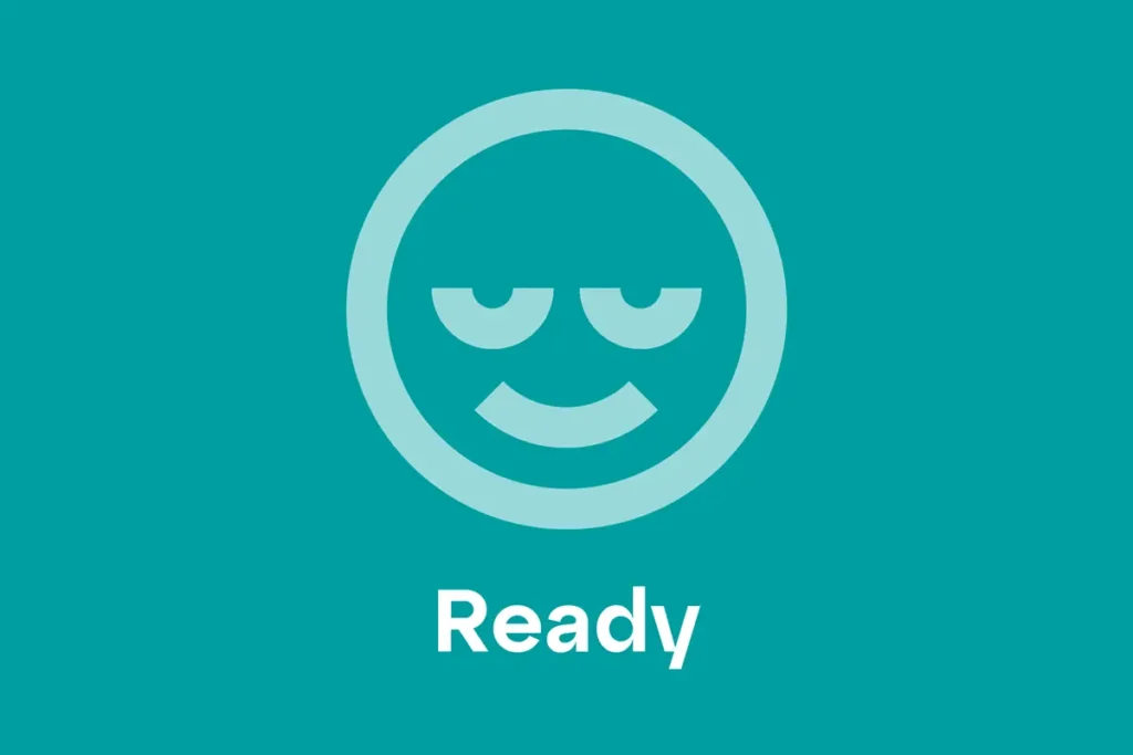 Blue background with a cartoon face looking engaged and ready. With the text "Ready" below