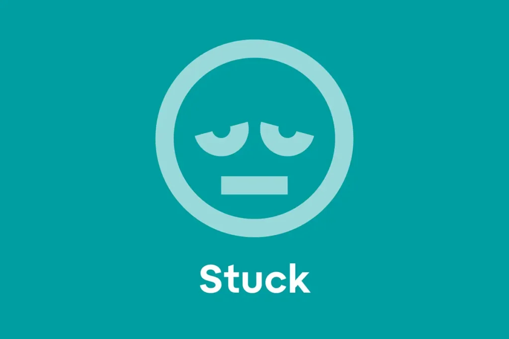 Blue background with a cartoon face looking discouraged. With the text "Stuck" below