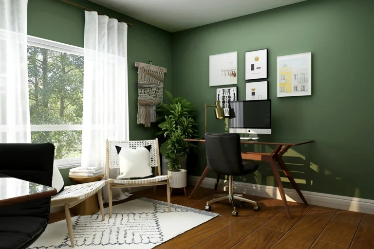 Image of stylish home office with green walls and a computer