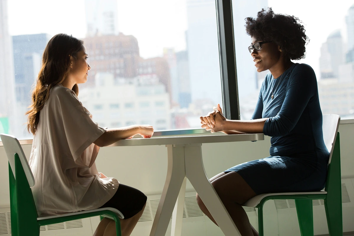 Image of a therapist and client talking