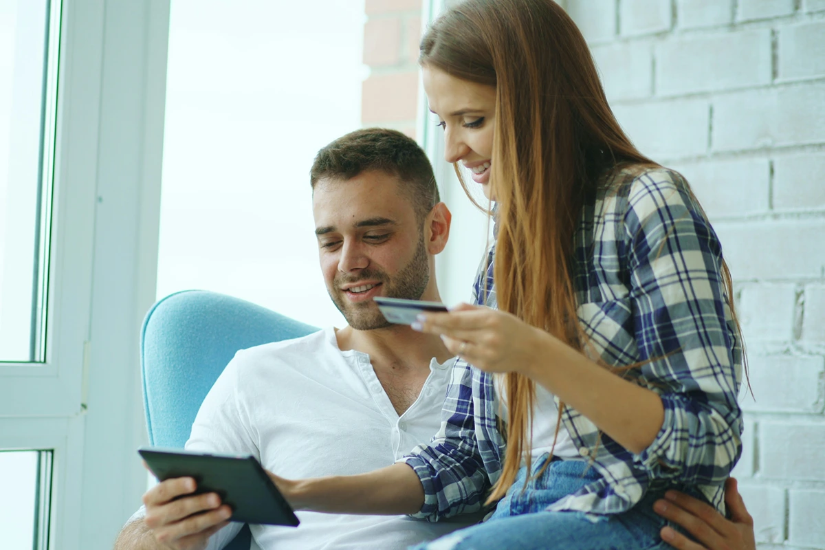 A couple with both on their phone
