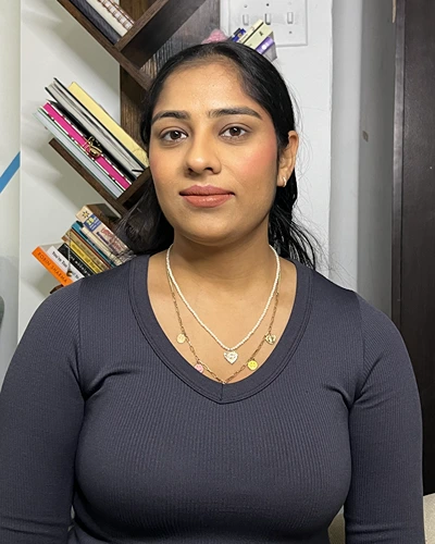 Headshot of Coach Simranjeet Kaur